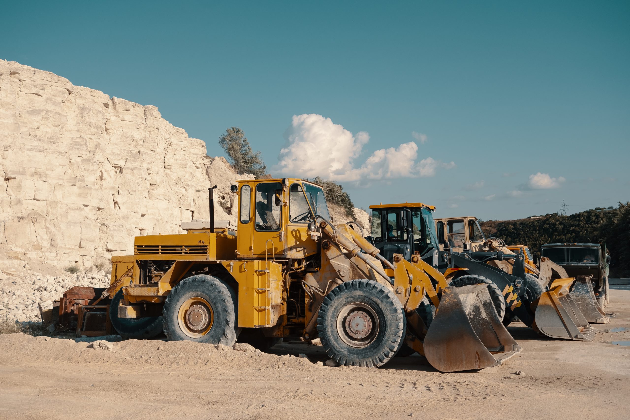 Heavy machinery in quarry. Building materials mining