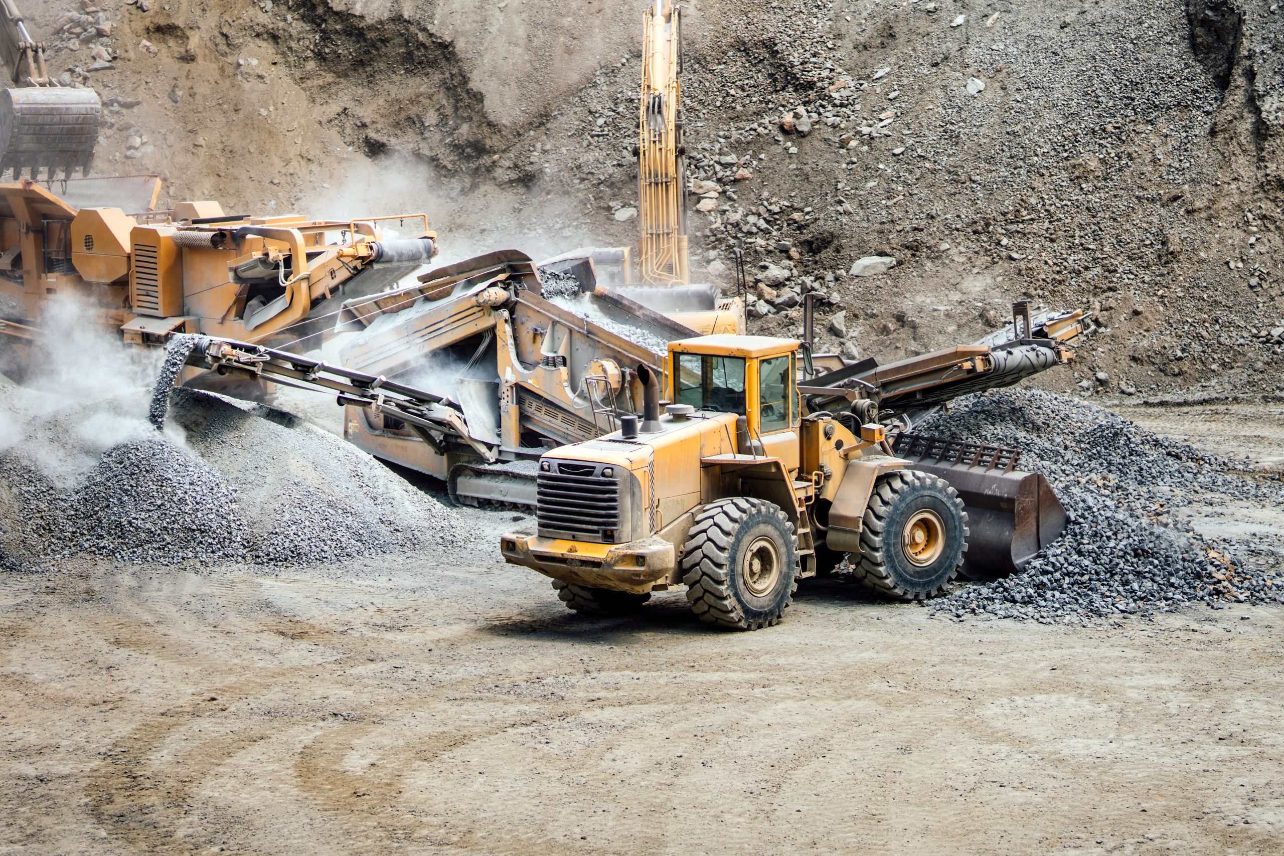 Wheel loader Industrial machinery details at quarry. Industry, construction works close up